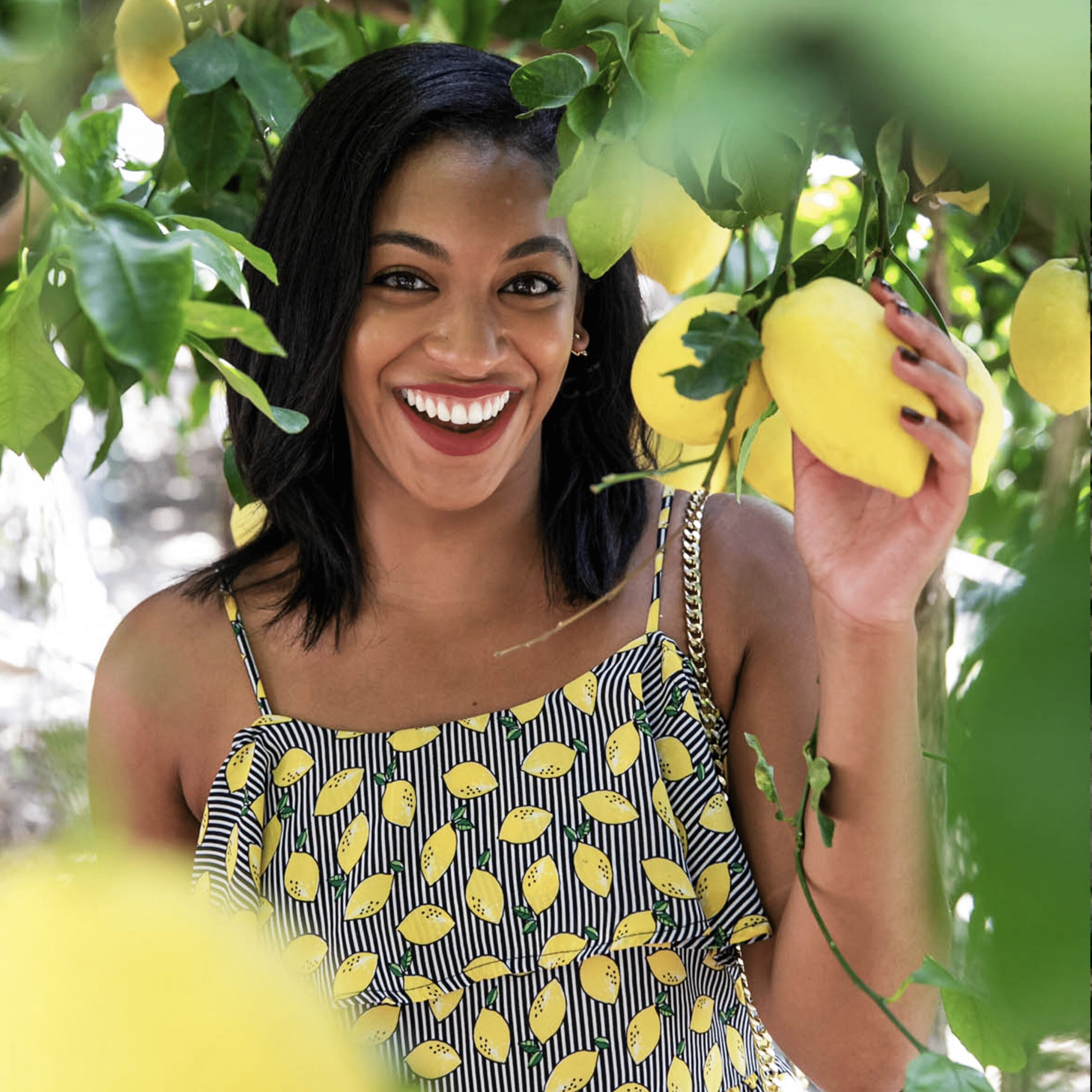 Dipaways Female Traveler Posing Under Lemon Tree On Amalfi Coast Lemon Tour Wearing A Lemon Shirt